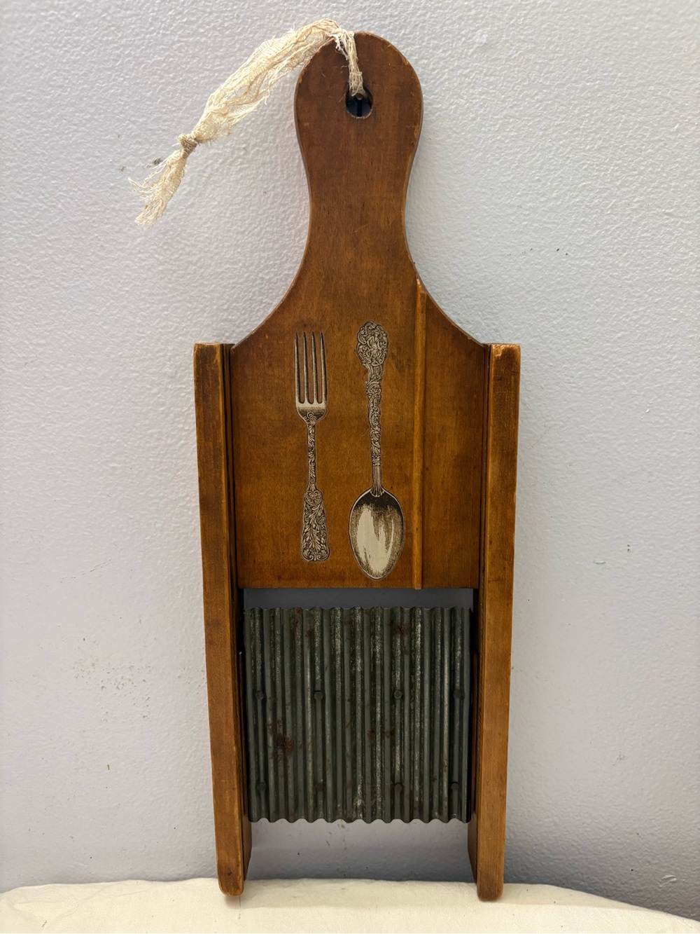 Rustic Brown Wooden Wall-Mount Potato Cutting Board with Fork & Spoon Design